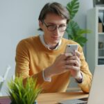 Person Holding Smartphone